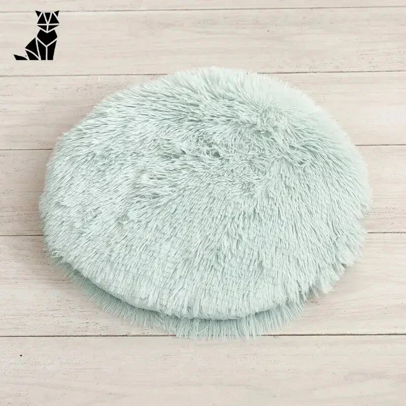 Lit rond bleu pelucheux pour chats et petits chiens